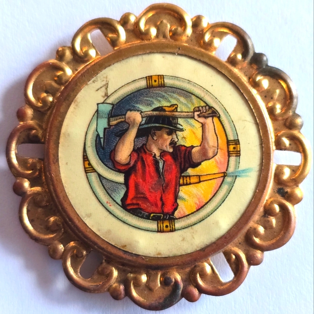 Antique firefighter brooch pin gold tone celluloid fireman fire man fighter